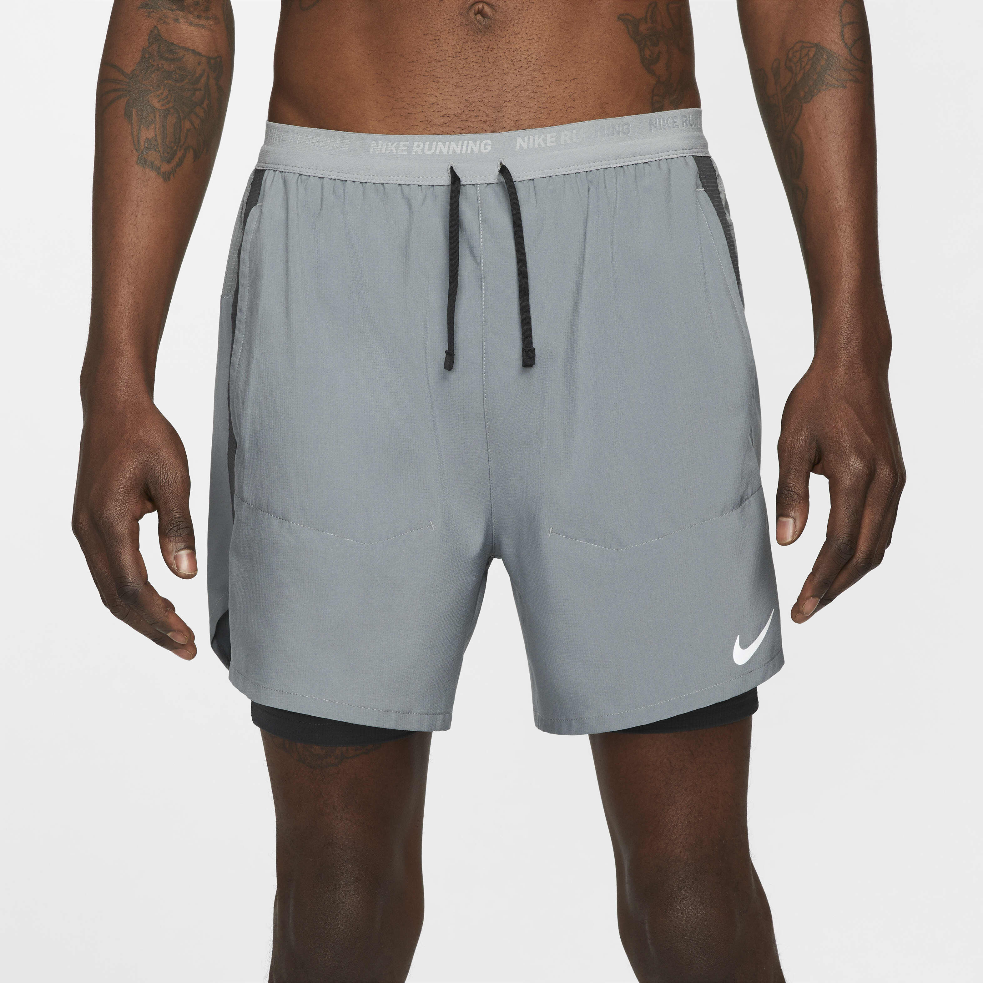 Buy Nike Stride Men s Dri FIT 13cm approx. Hybrid Running Shorts Nike Saudi Official