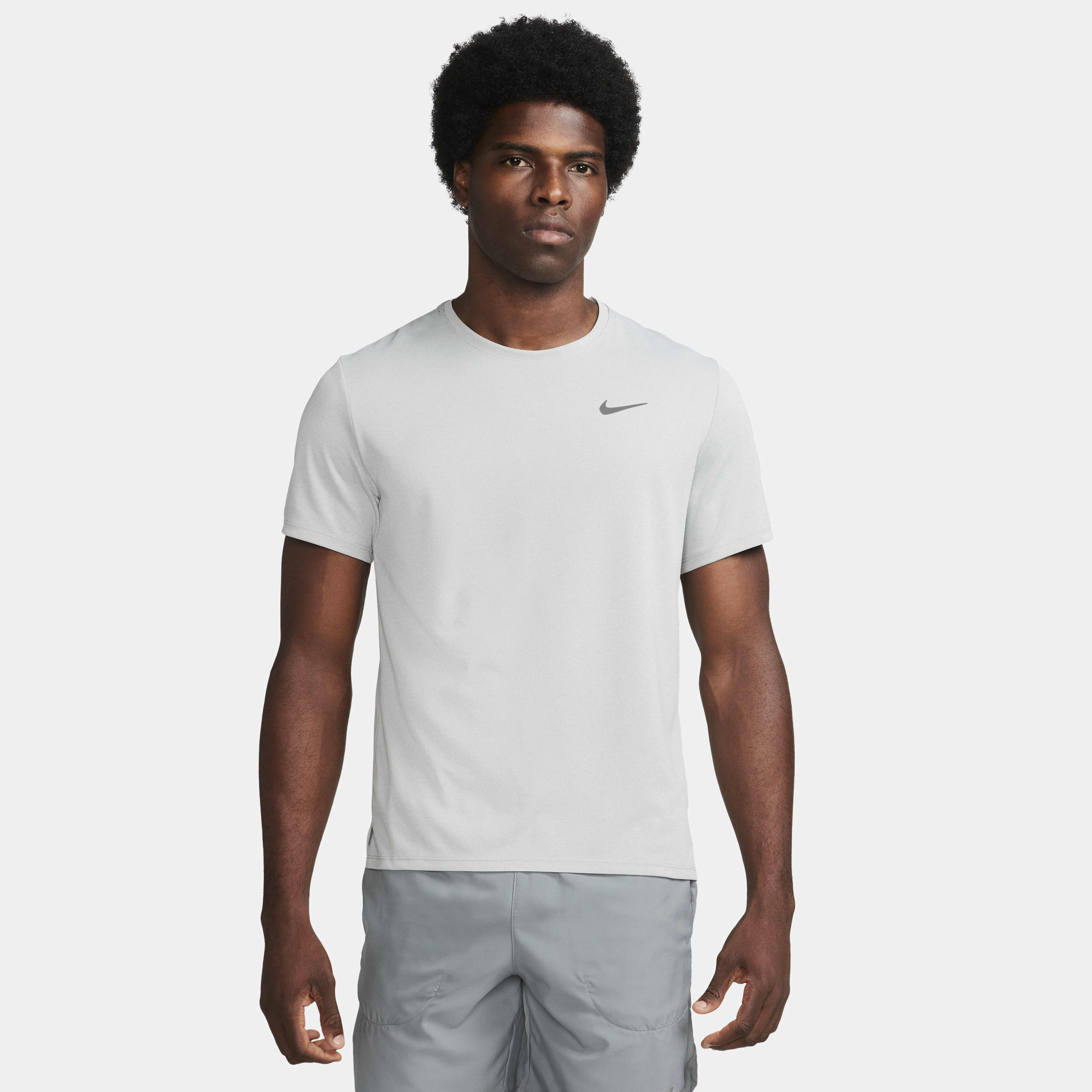 Buy Nike Miler Men s Dri FIT UV Short Sleeve Running Top Grey Fog Particle Grey Heather Nike Saudi Official