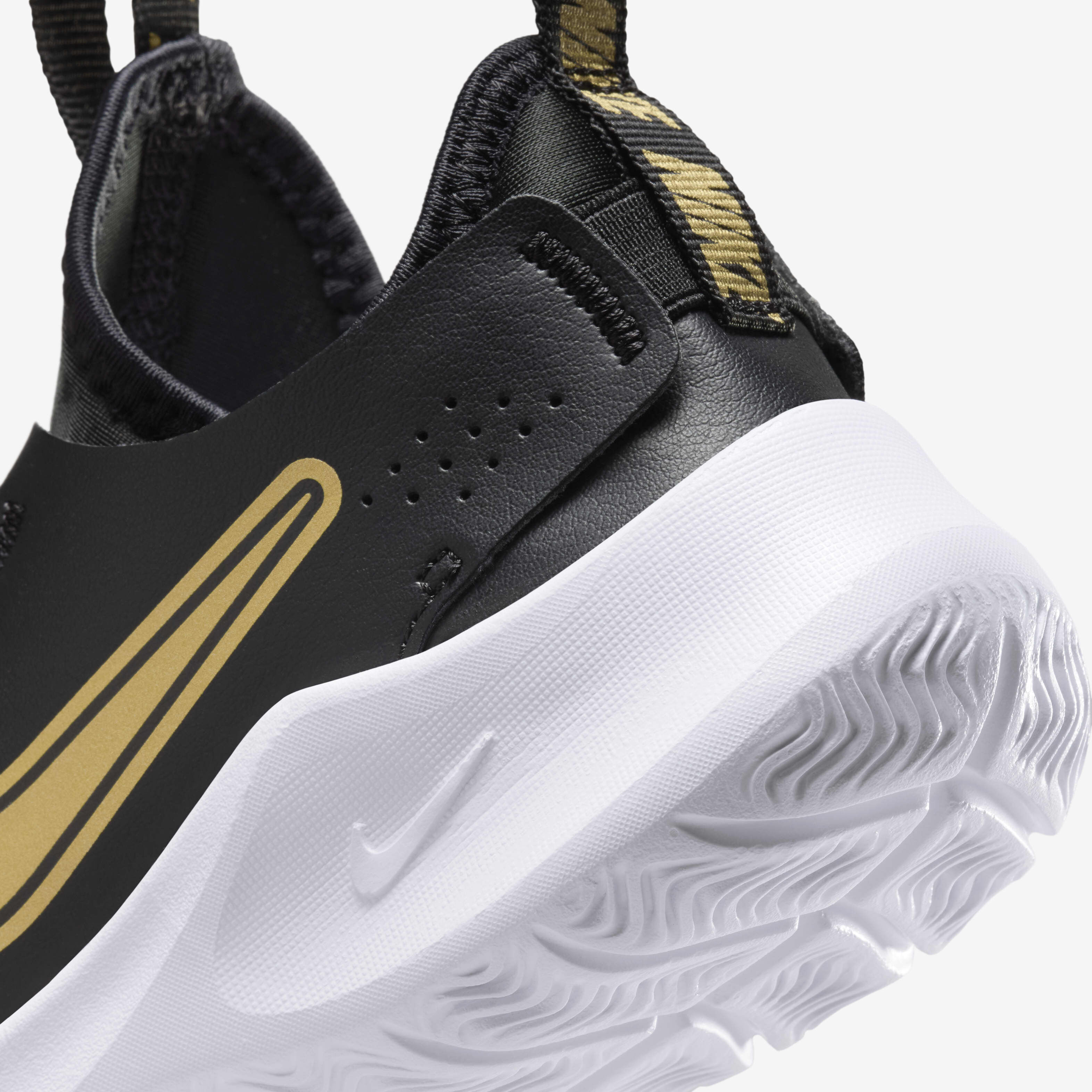 Nike flex black and gold sales