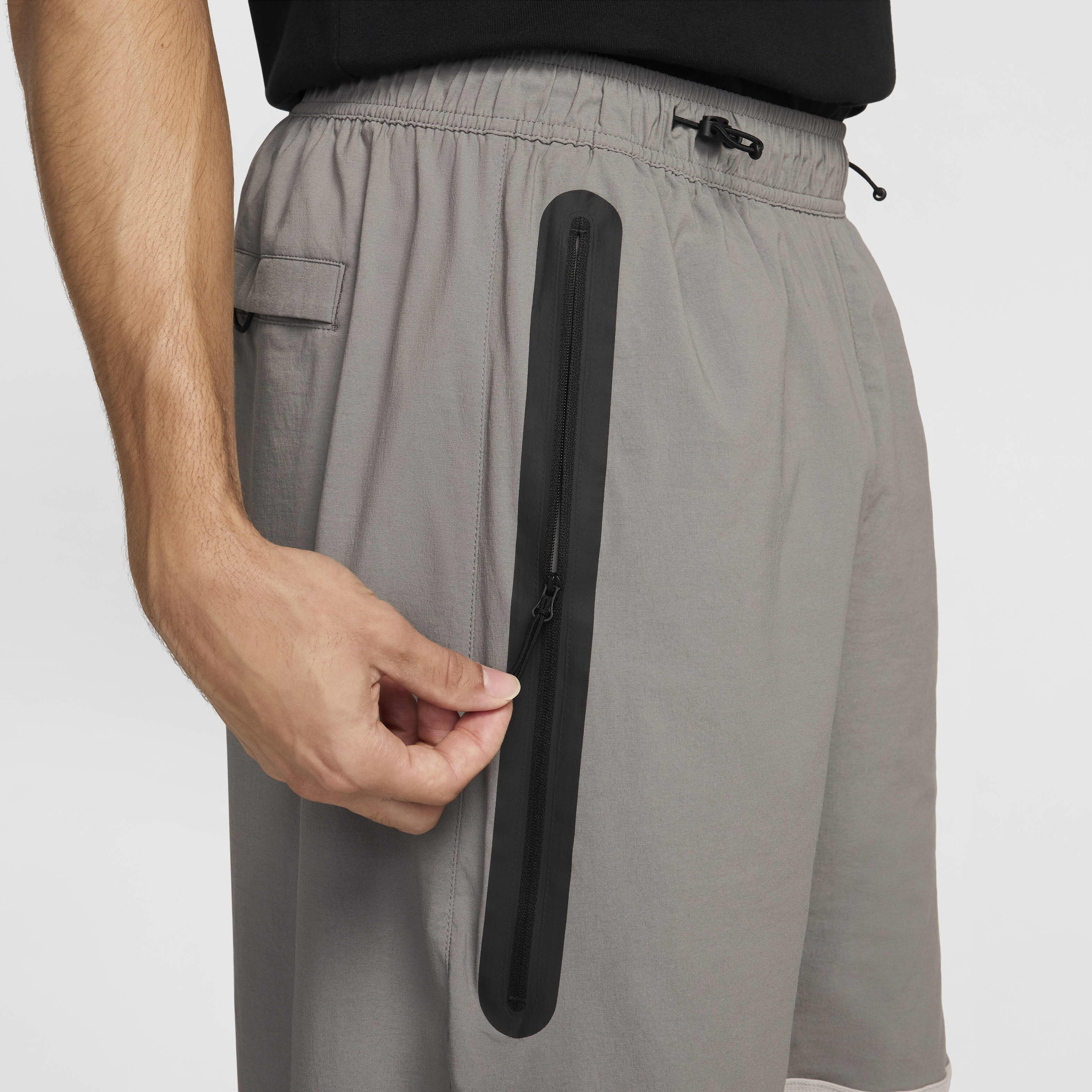 Buy Nike Tech Men's Woven Oversized Trousers - Flat Pewter/Light Iron  Ore/Black | Nike Saudi Official