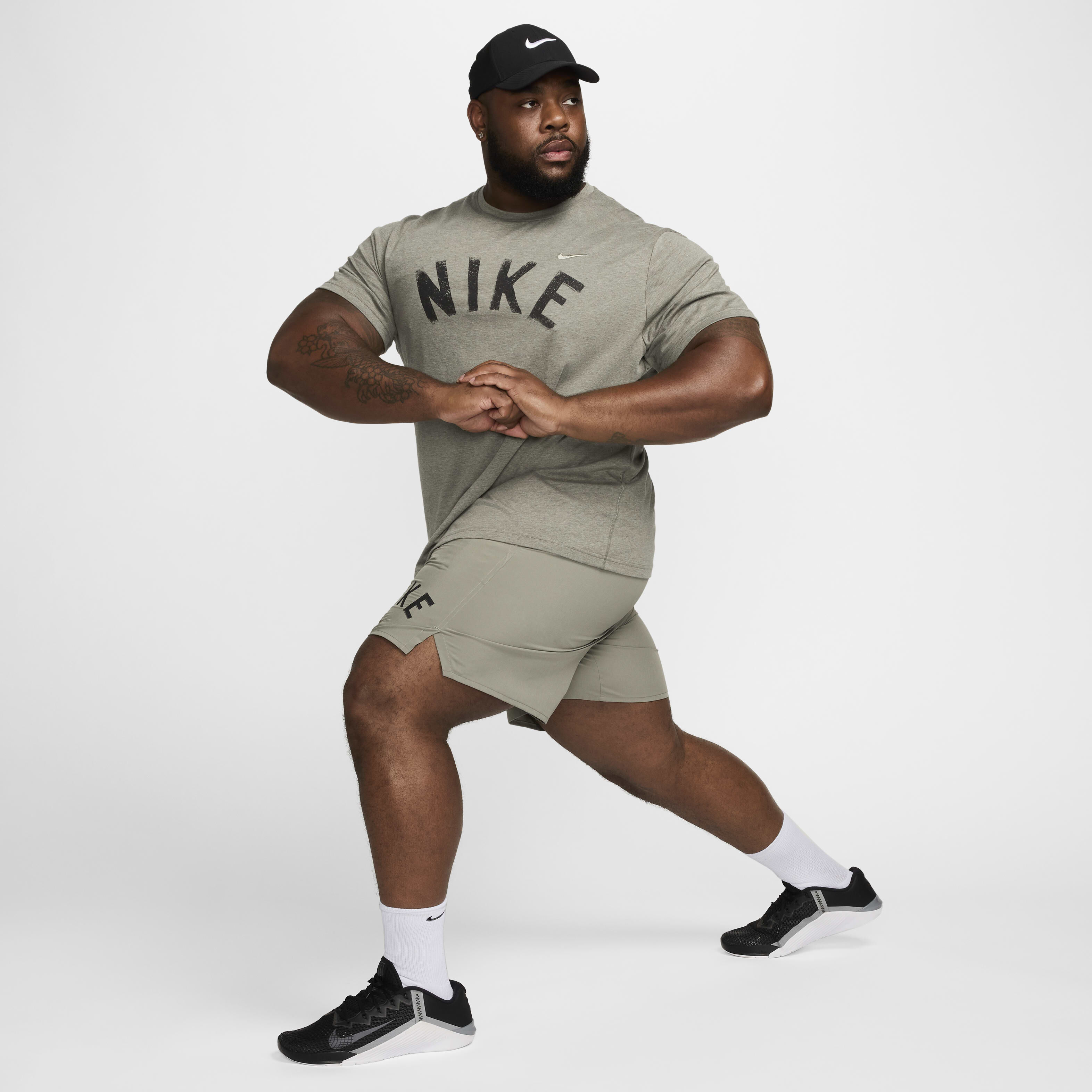 Buy Nike Primary Swoosh Men's Dri-FIT Short-Sleeve Versatile