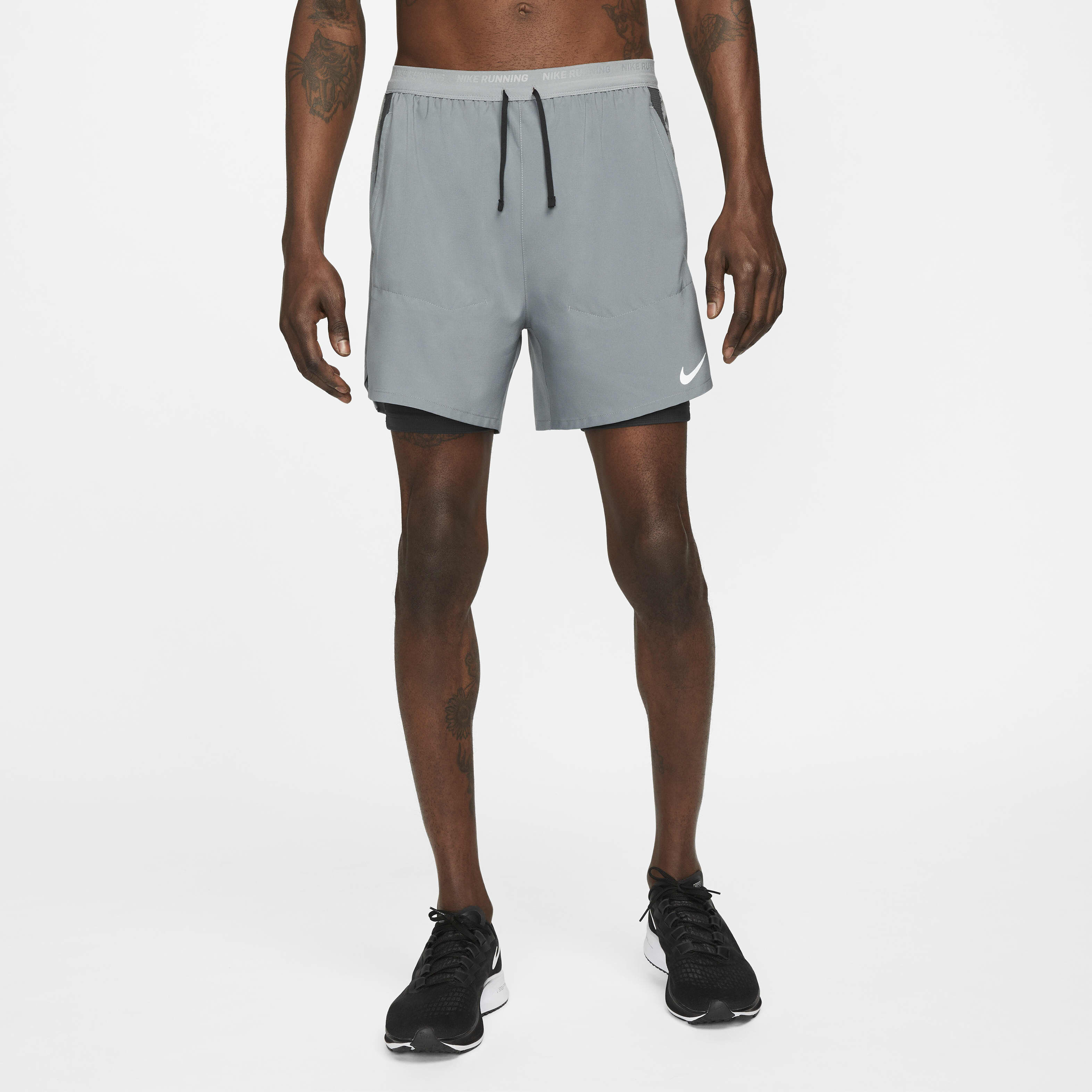 Buy Nike Stride Men s Dri FIT 13cm approx. Hybrid Running Shorts Nike Saudi Official