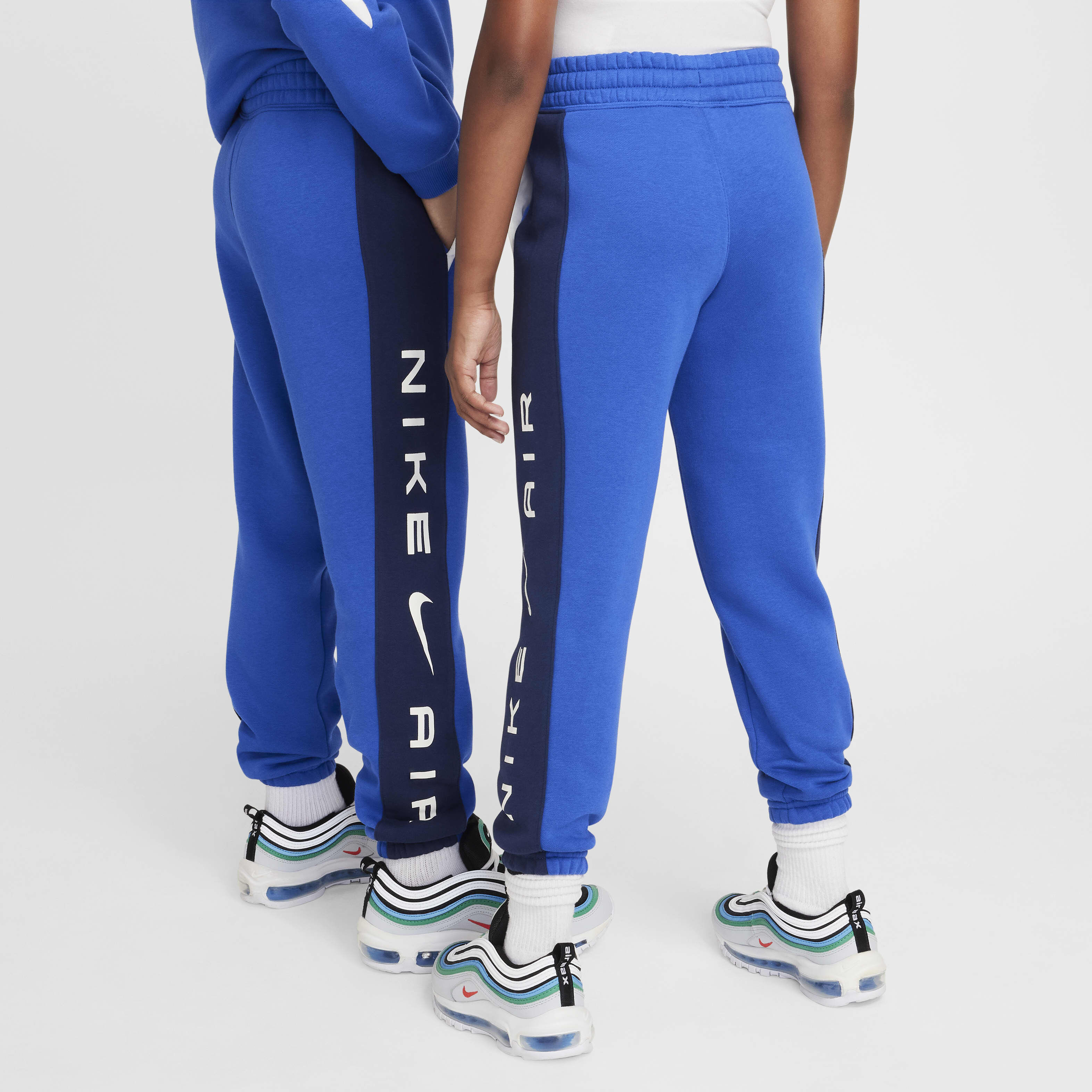 Nike air track pants junior store