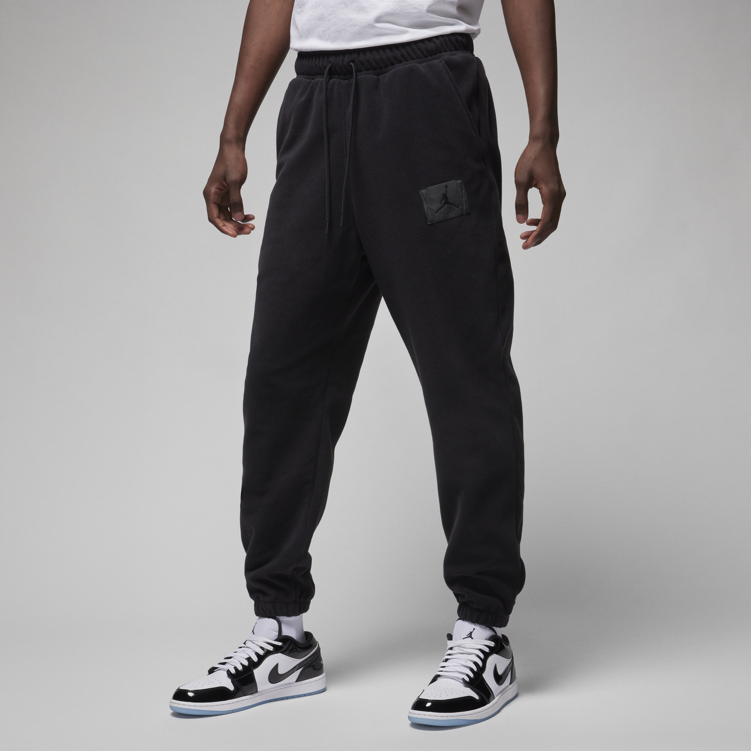 Nike poly hotsell taped track pants