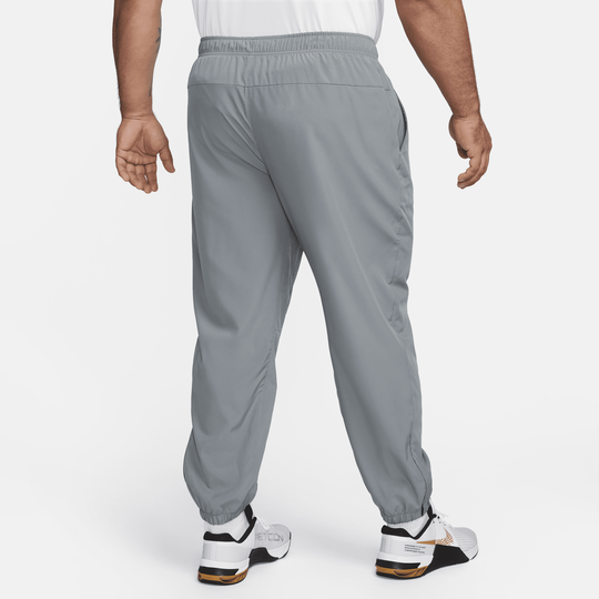 Nike guppy sales track pants