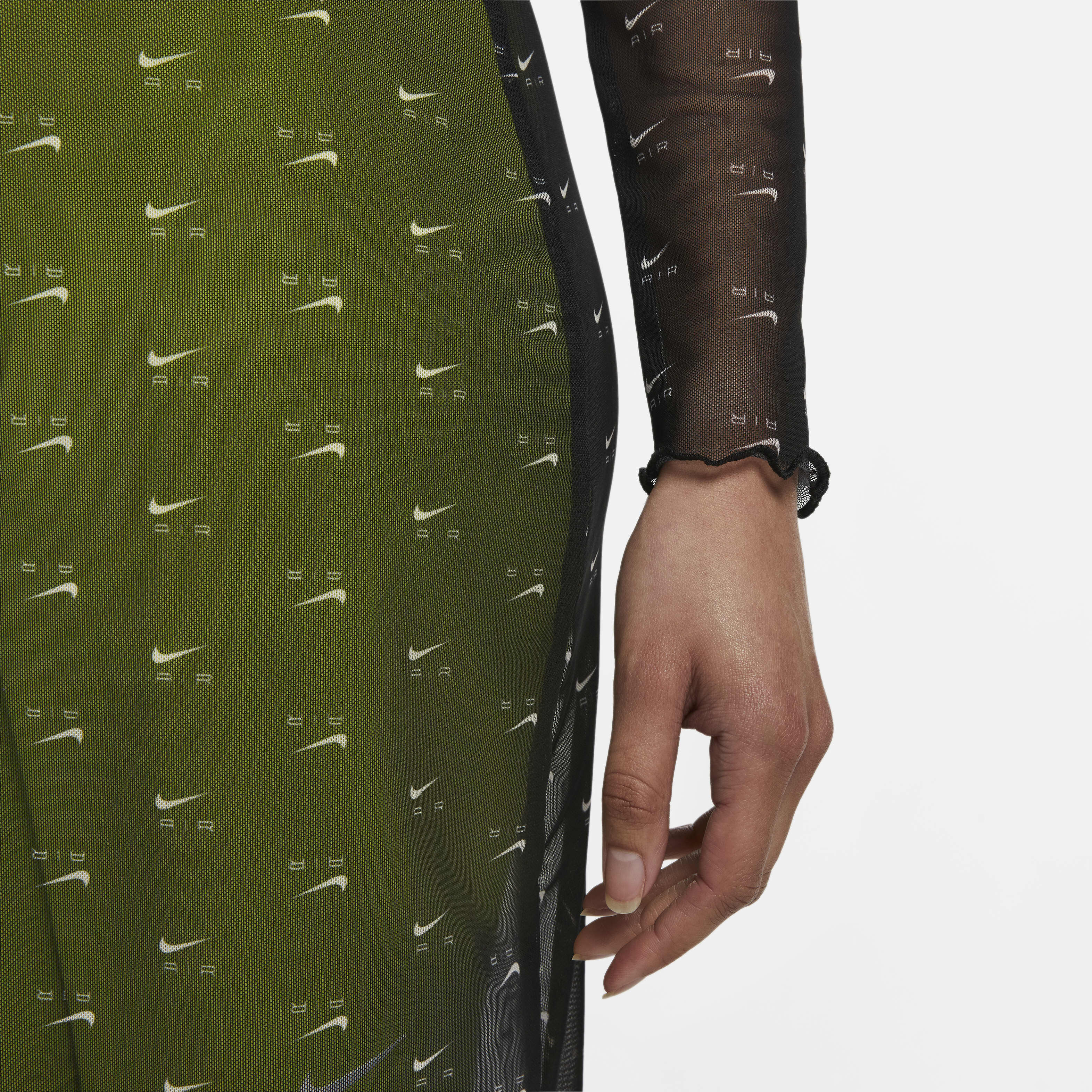 Buy Nike Air Women s Printed Mesh Long sleeve Dress Black Nike Saudi Official