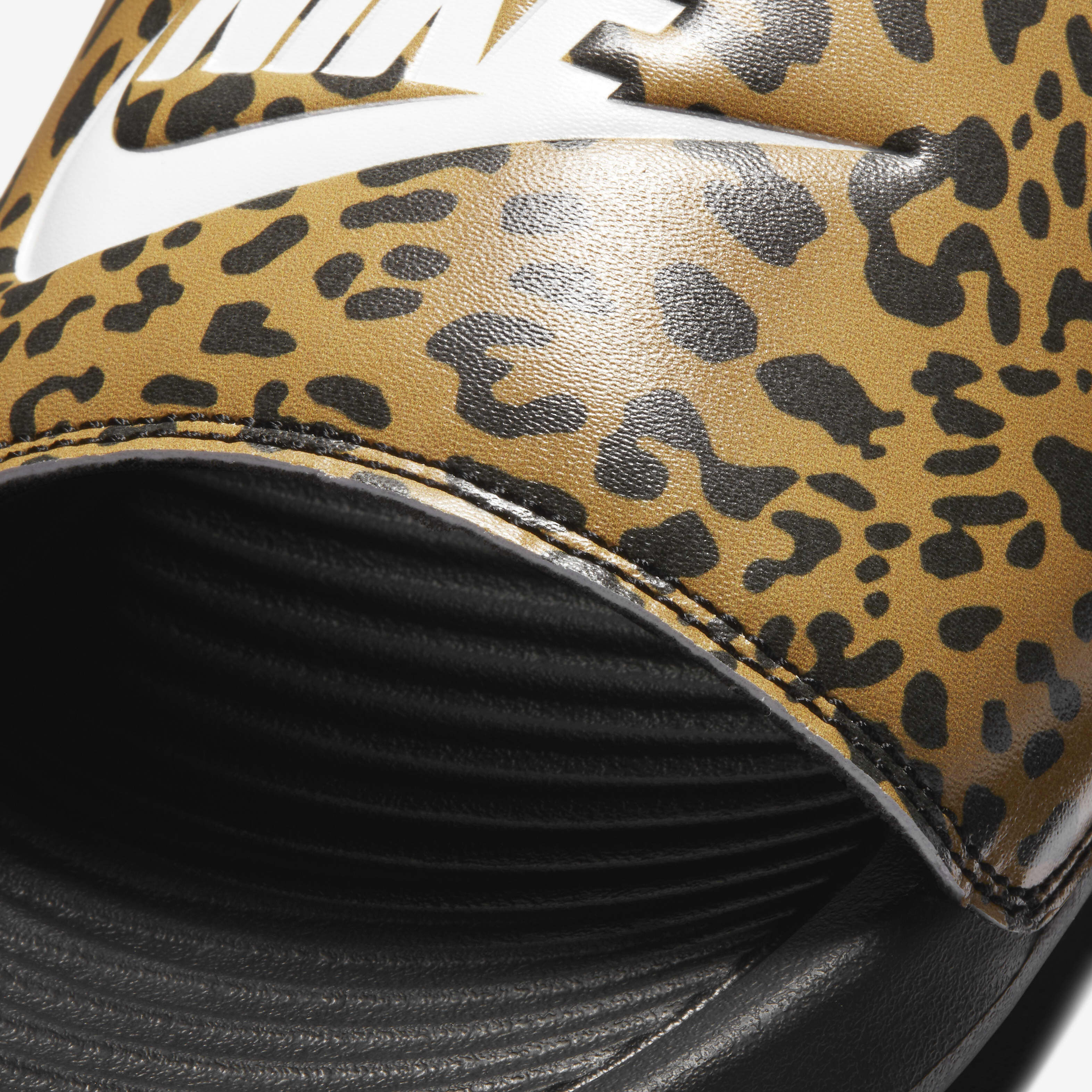 Nike leopard sliders hotsell