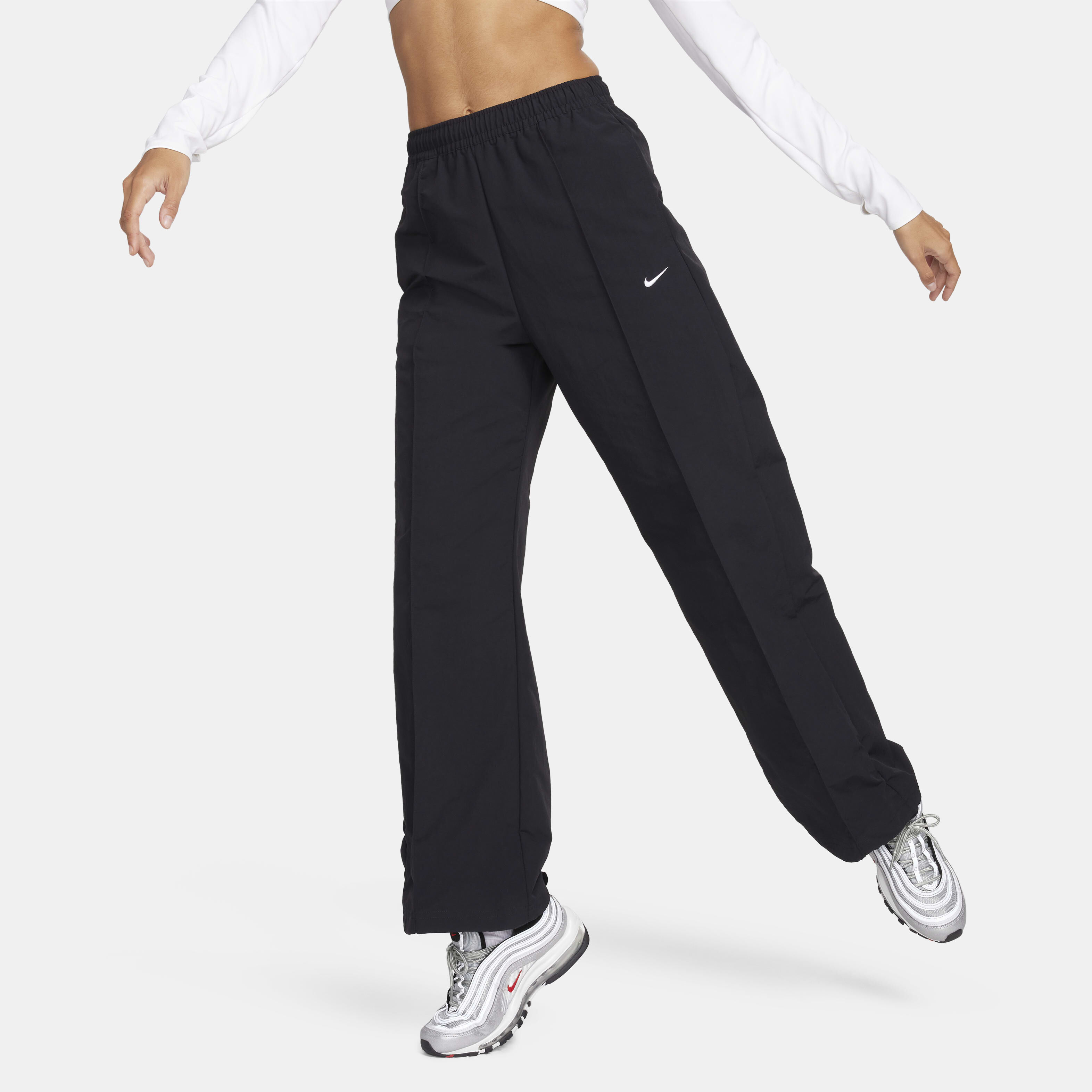 Buy Nike Sportswear Everything Wovens Women s Mid Rise Open Hem Trousers Black White Nike Saudi Official