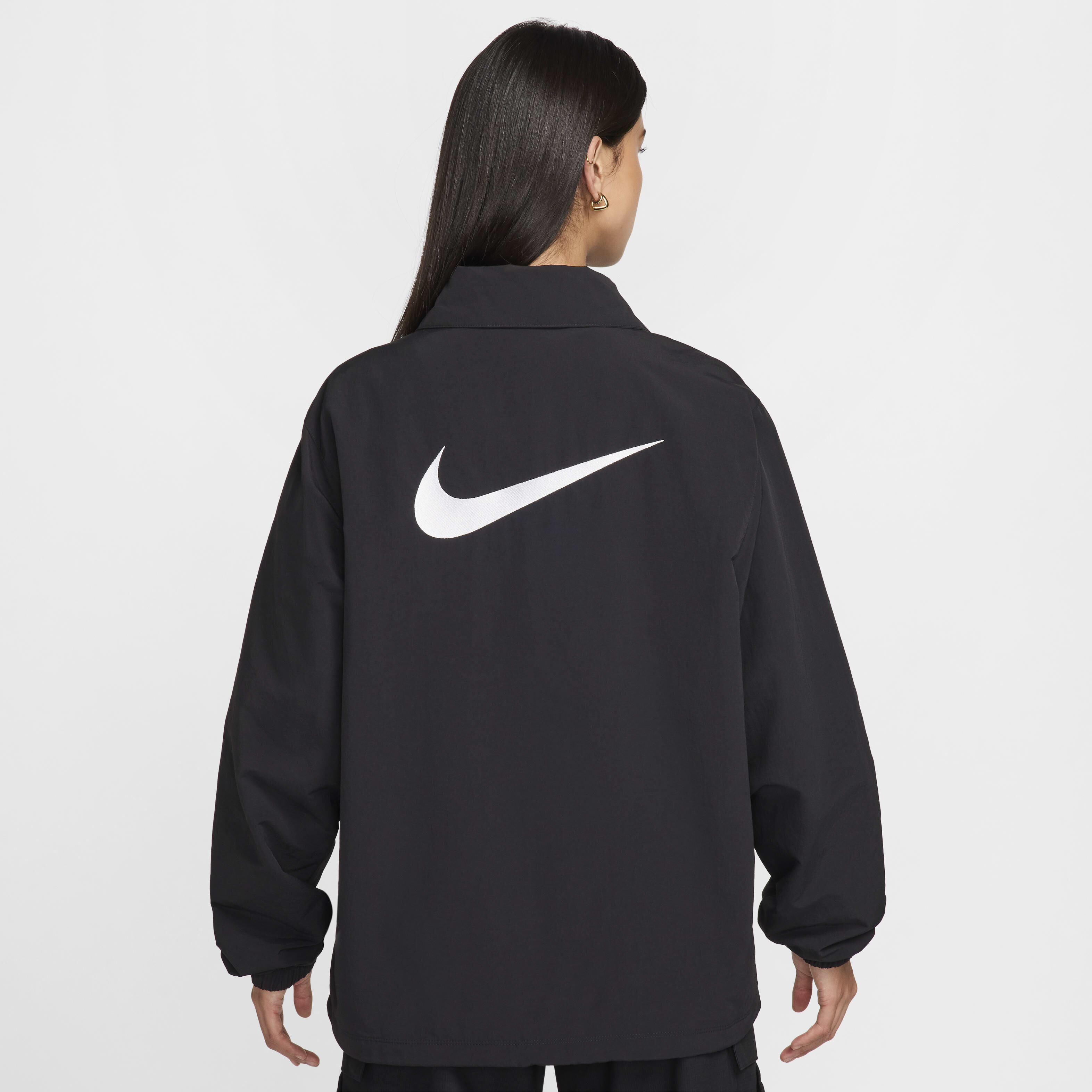 Buy Nike Sportswear Essential Women s Oversized UV Woven Coaches Jacket Nike Saudi Official