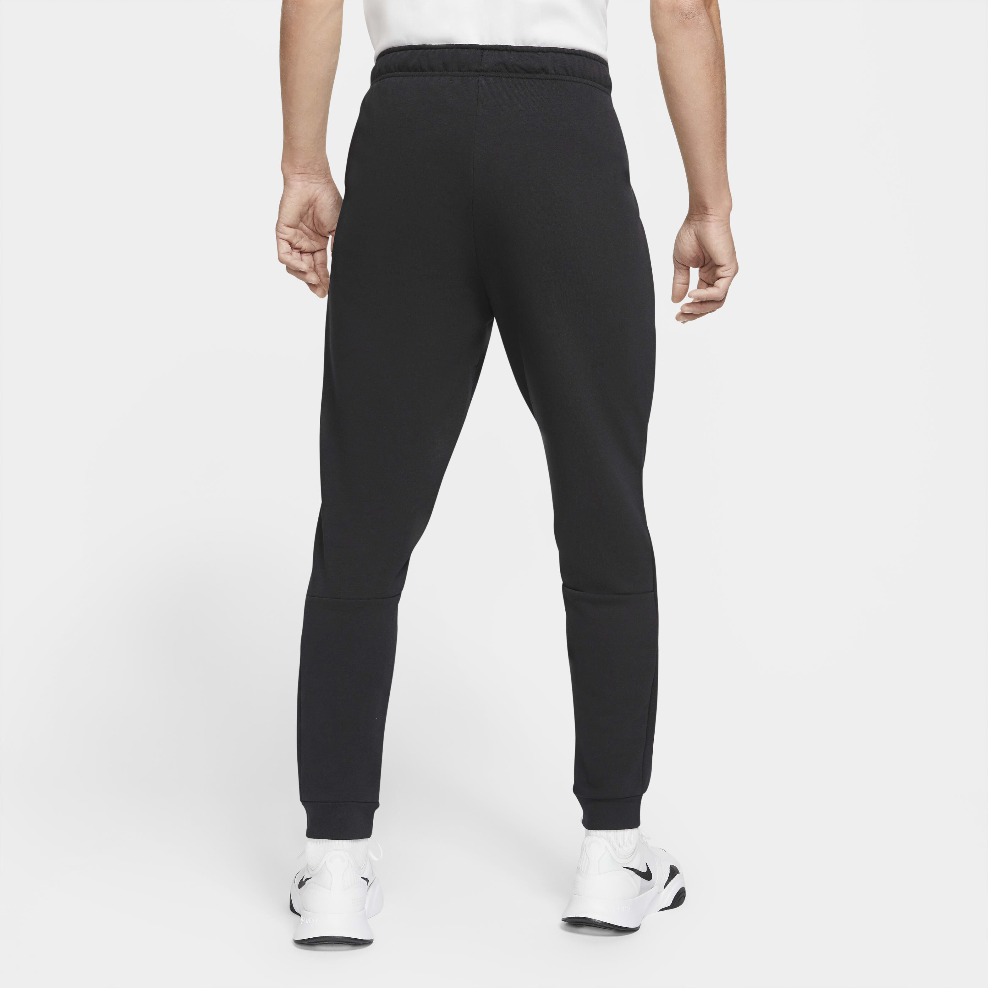 Buy Nike Dry Men s Dri FIT Taper Fitness Fleece Trousers Nike Saudi Official