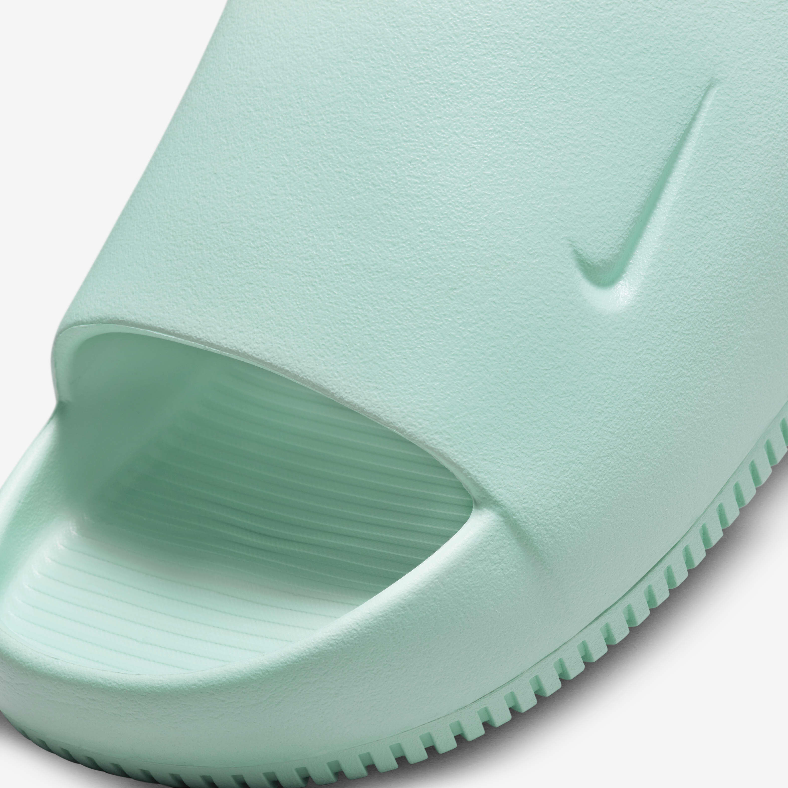 Buy Nike Calm Women s Slides Jade Ice Jade Ice Nike Saudi Official