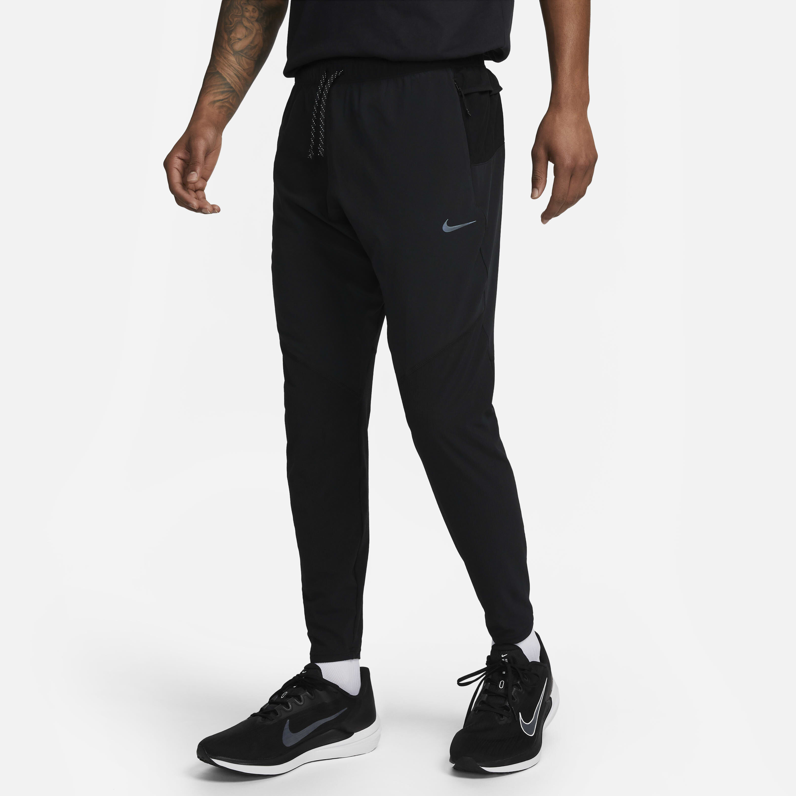Buy Nike Dri FIT Running Division Phenom Men s Slim Fit Running Trousers Nike Saudi Official
