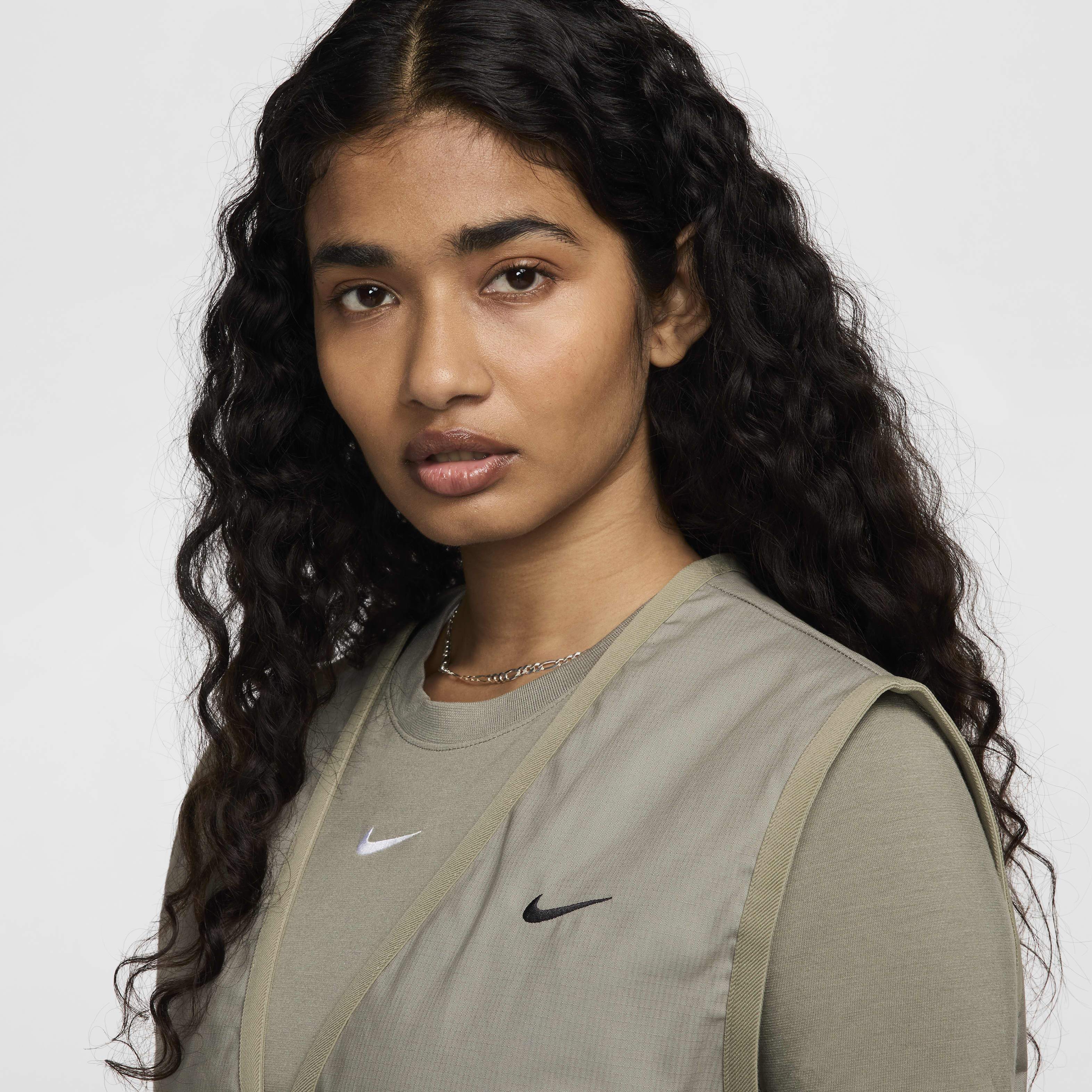 Buy Nike Sportswear Essential Women s Loose Woven Cargo Vest Nike Saudi Official