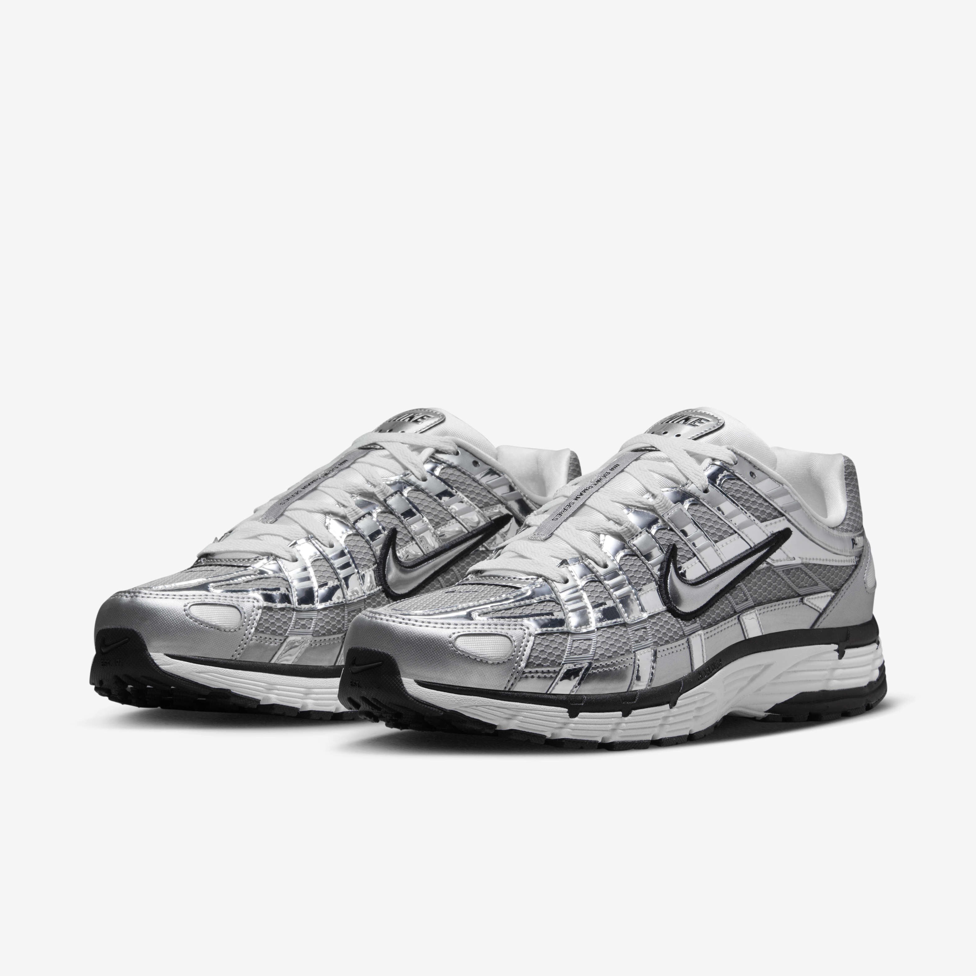 Silver nike shoes deals