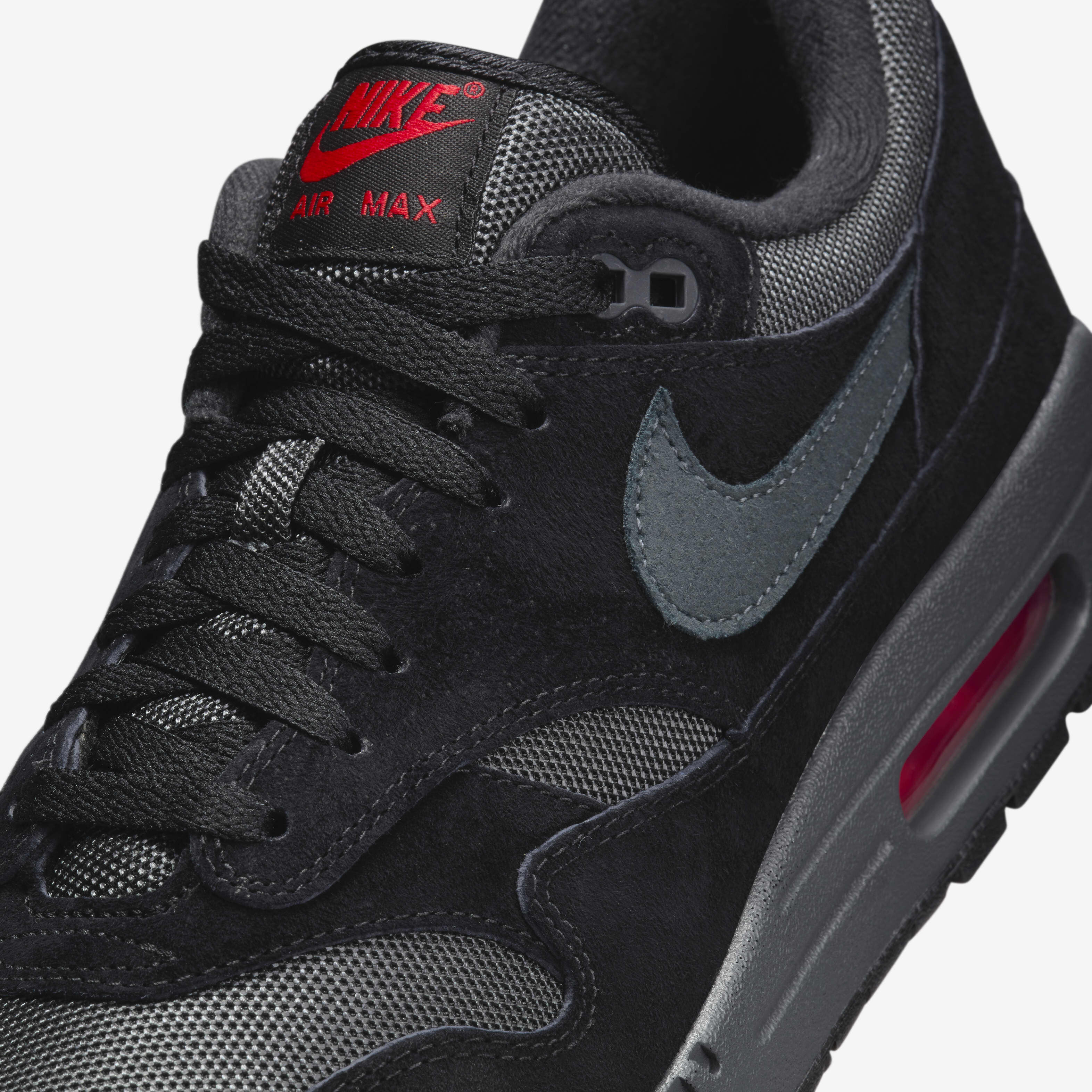Nike revolution 2 anthracite black volt pimento top