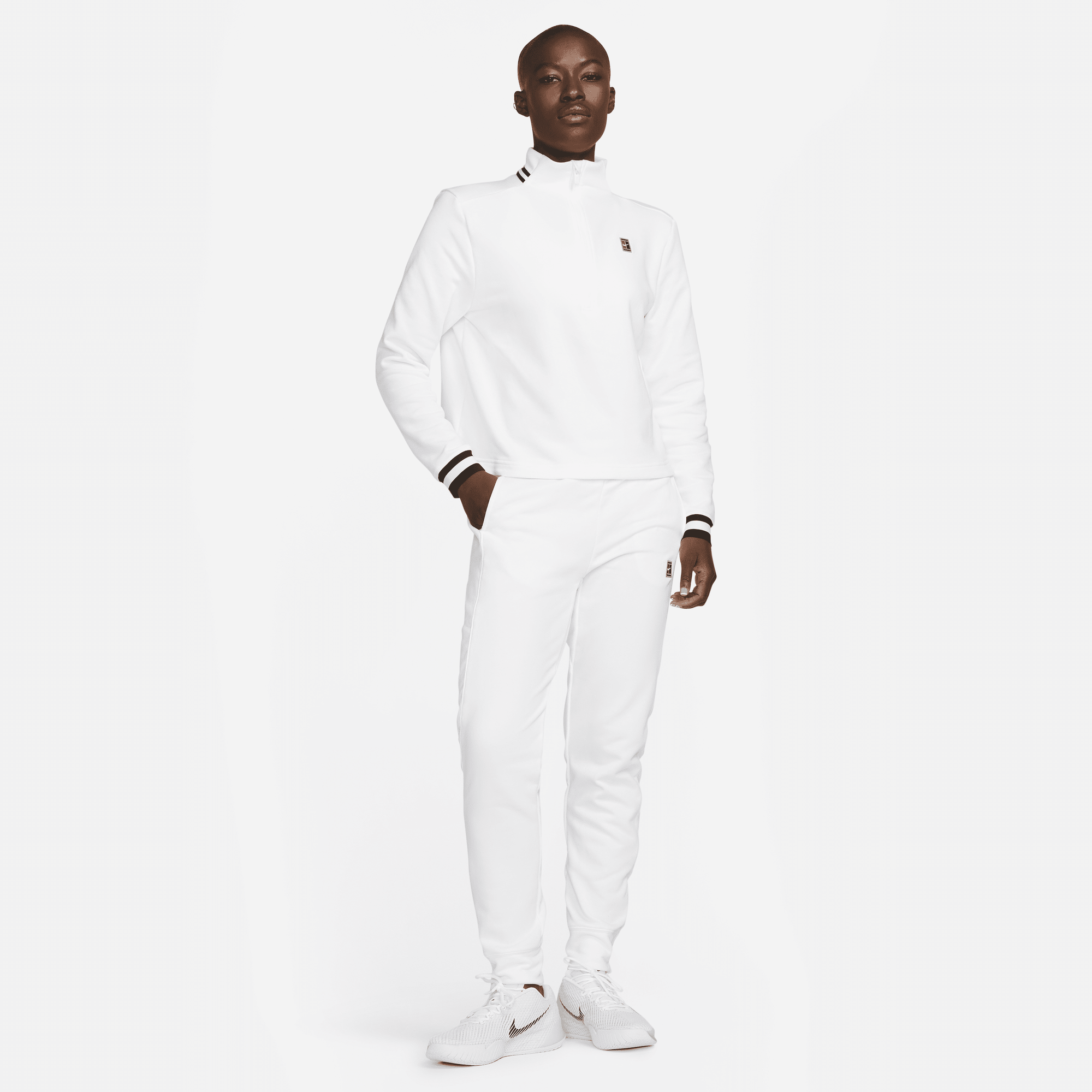 Shop NikeCourt Dri FIT Heritage Women s French Terry Tennis Top
