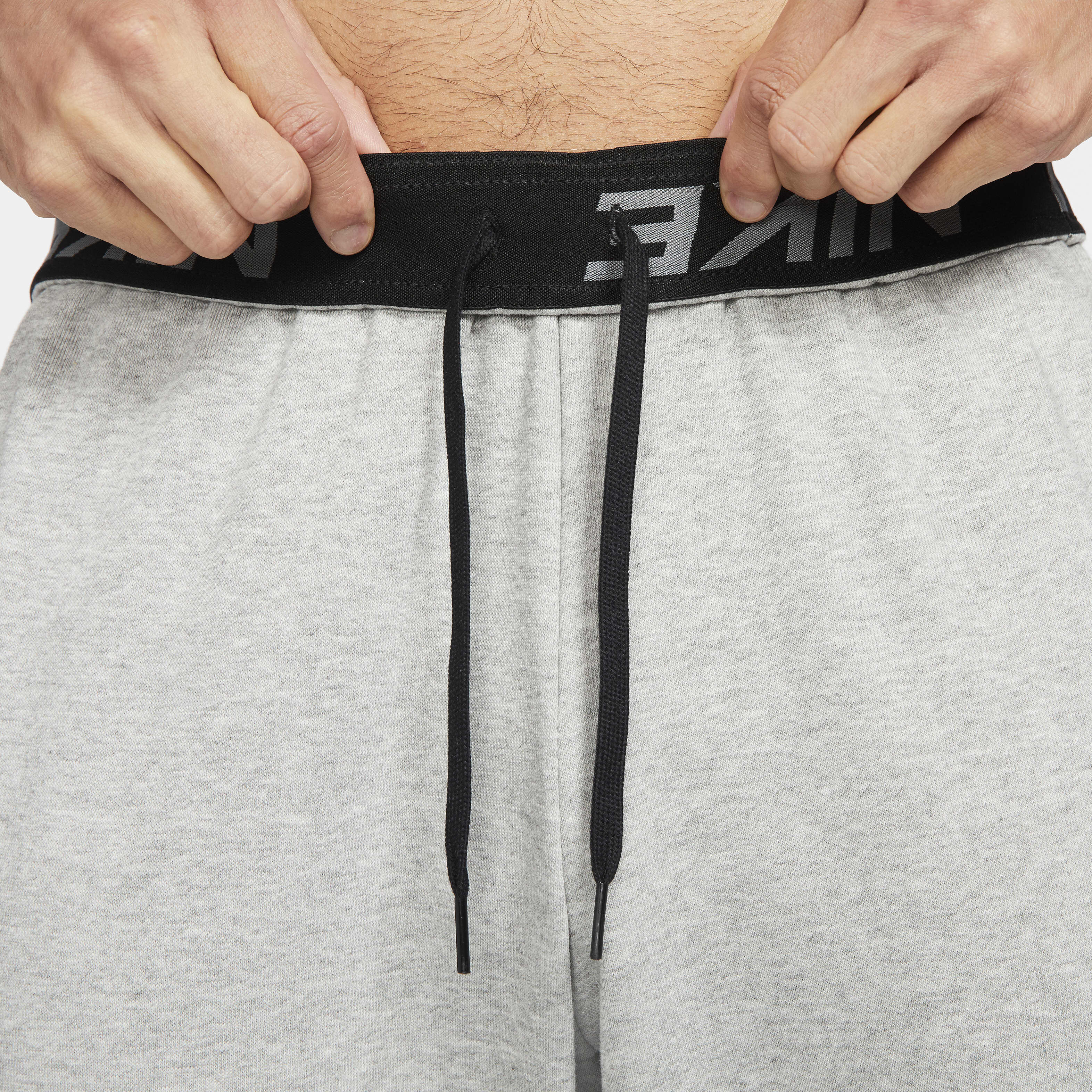 Buy Nike Dry Men s Dri FIT Taper Fitness Fleece Trousers Nike Saudi Official