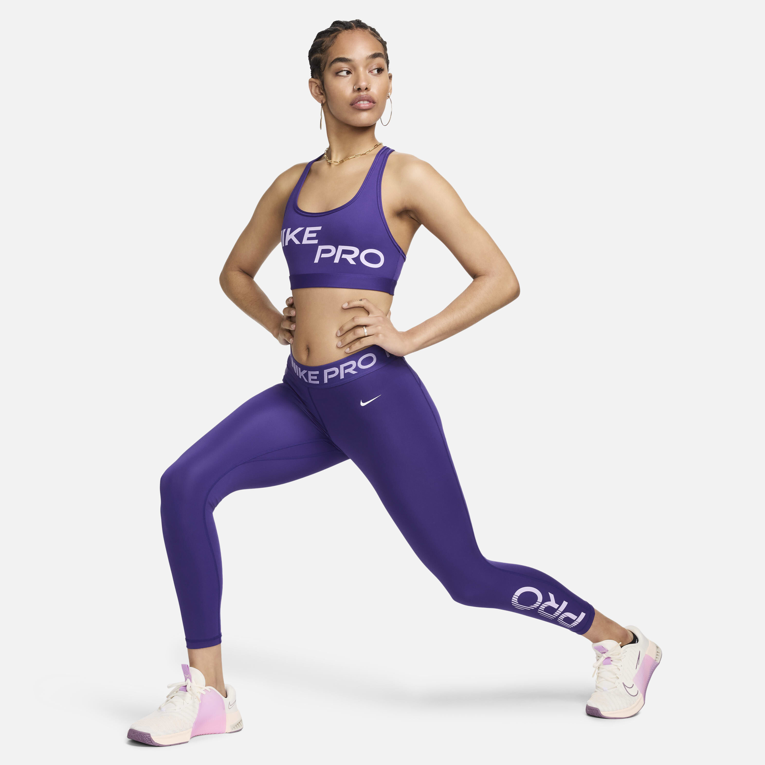 Buy Nike Pro Swoosh Light Support Women s Non Padded Graphic Sports Bra Court Purple White Nike Saudi Official