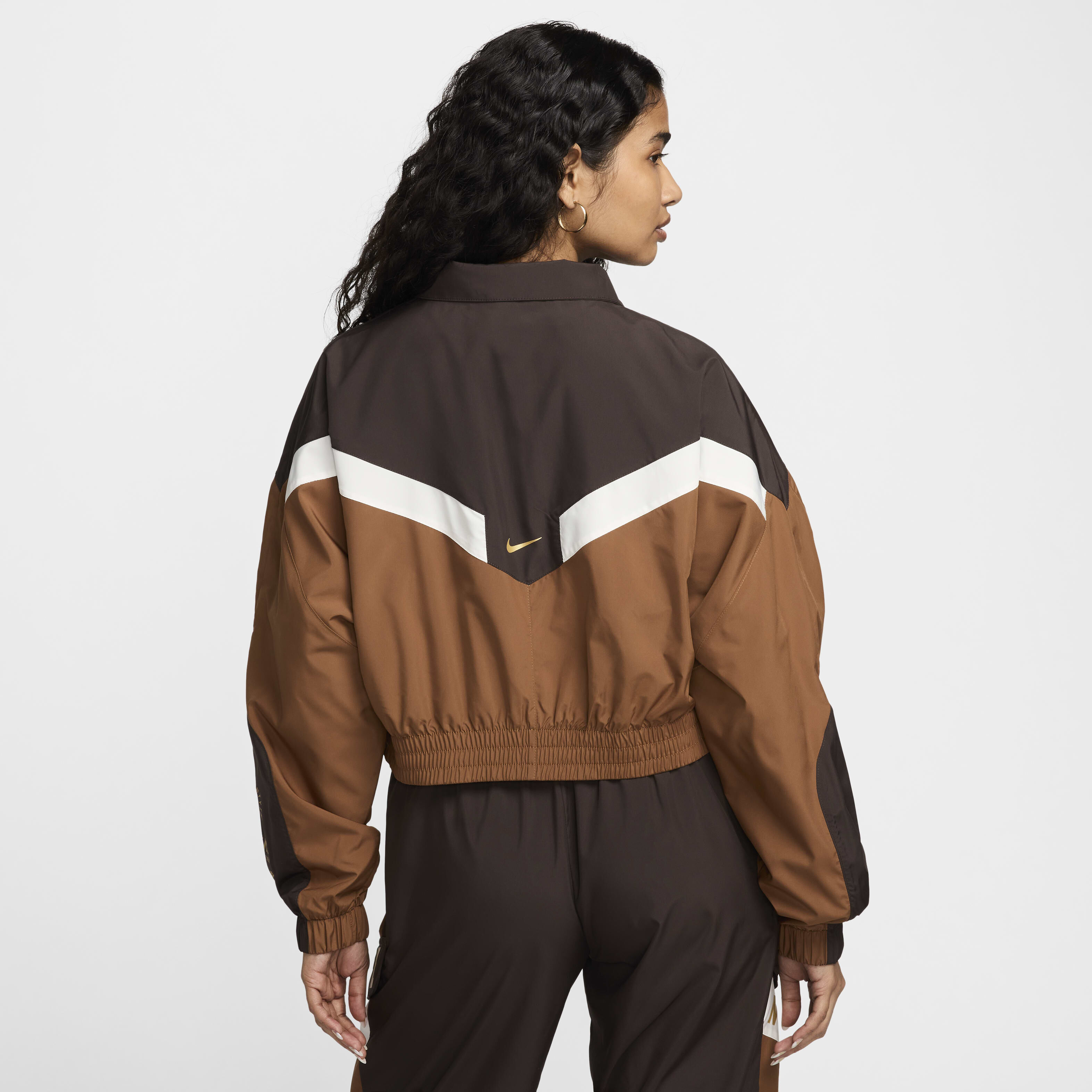 Buy Nike Sportswear Women s Woven Jacket Velvet Brown Light British Tan Sail Nike Saudi Official