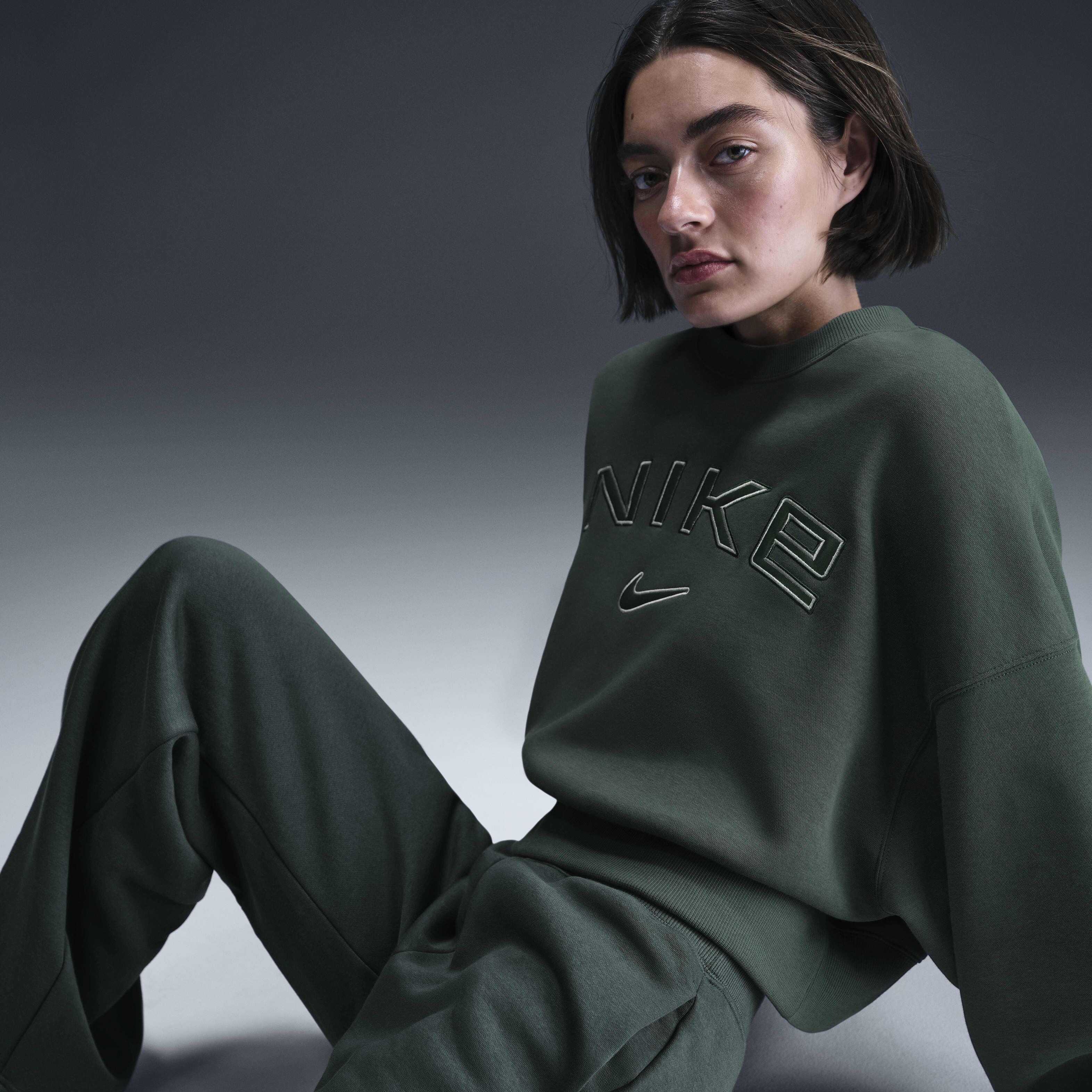 Nike logo all over sweatshirt top