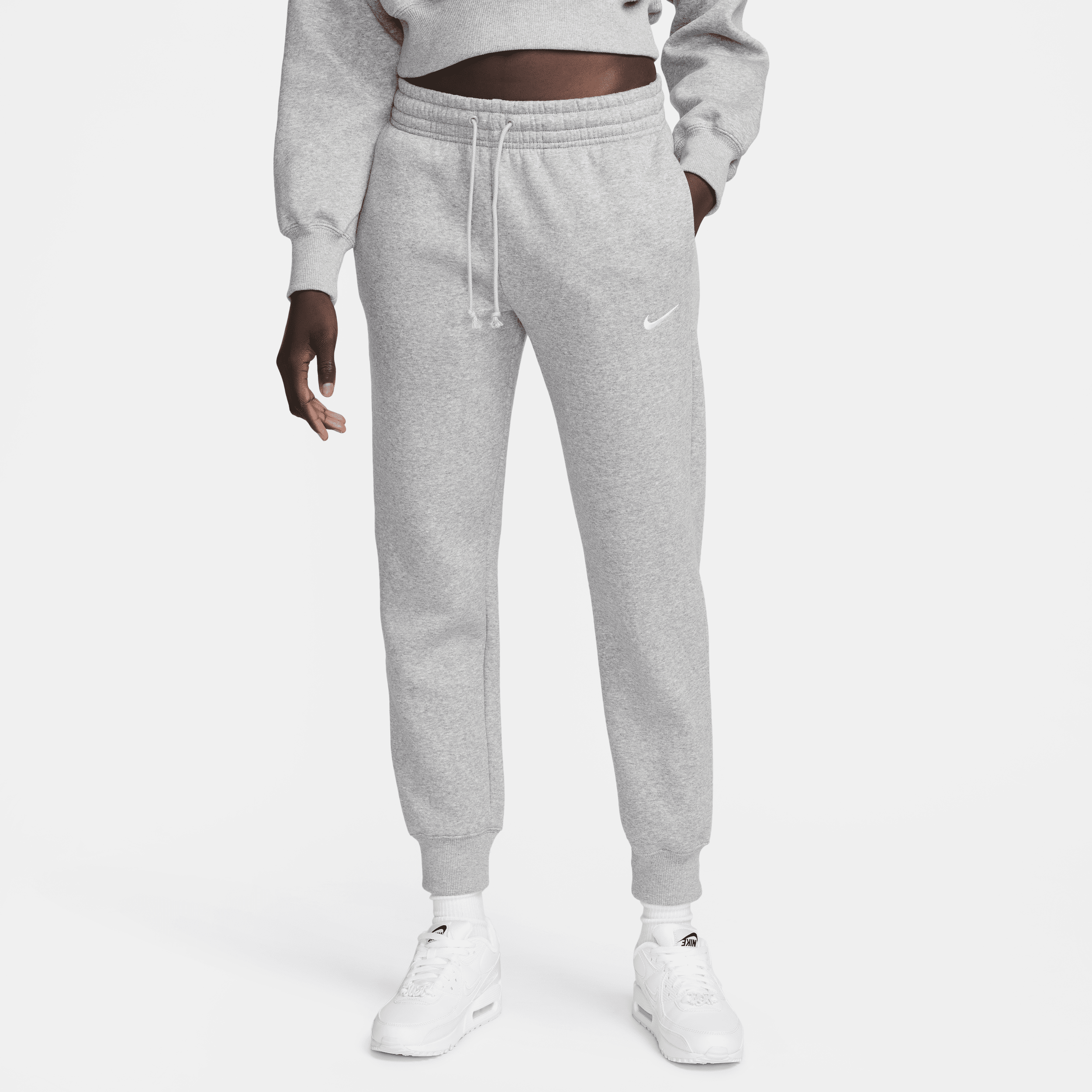 Shop Sportswear Phoenix Fleece Women s Mid Rise Tracksuit Bottoms
