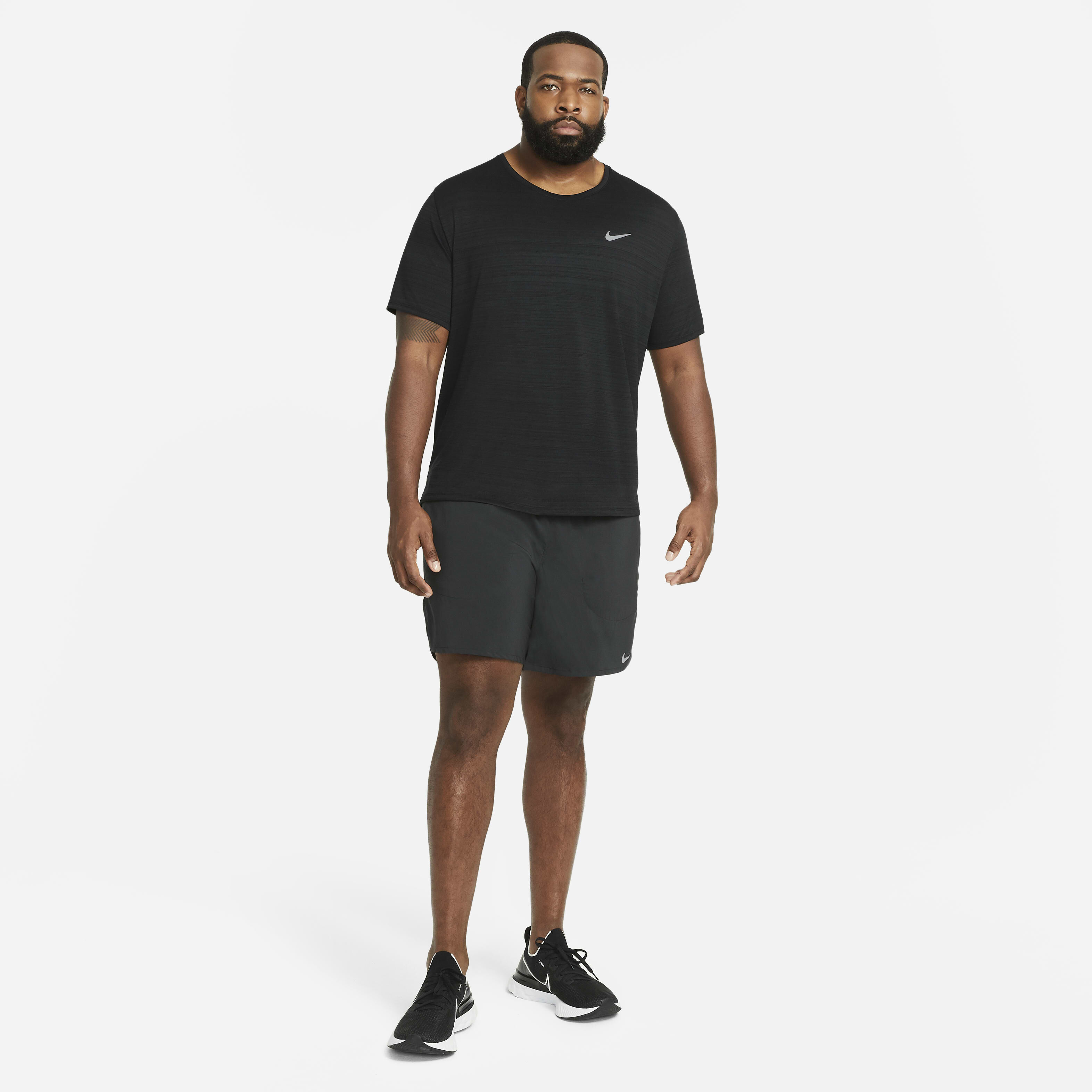 Buy Nike Dri-FIT Miler Men's Running Top - Black | Nike