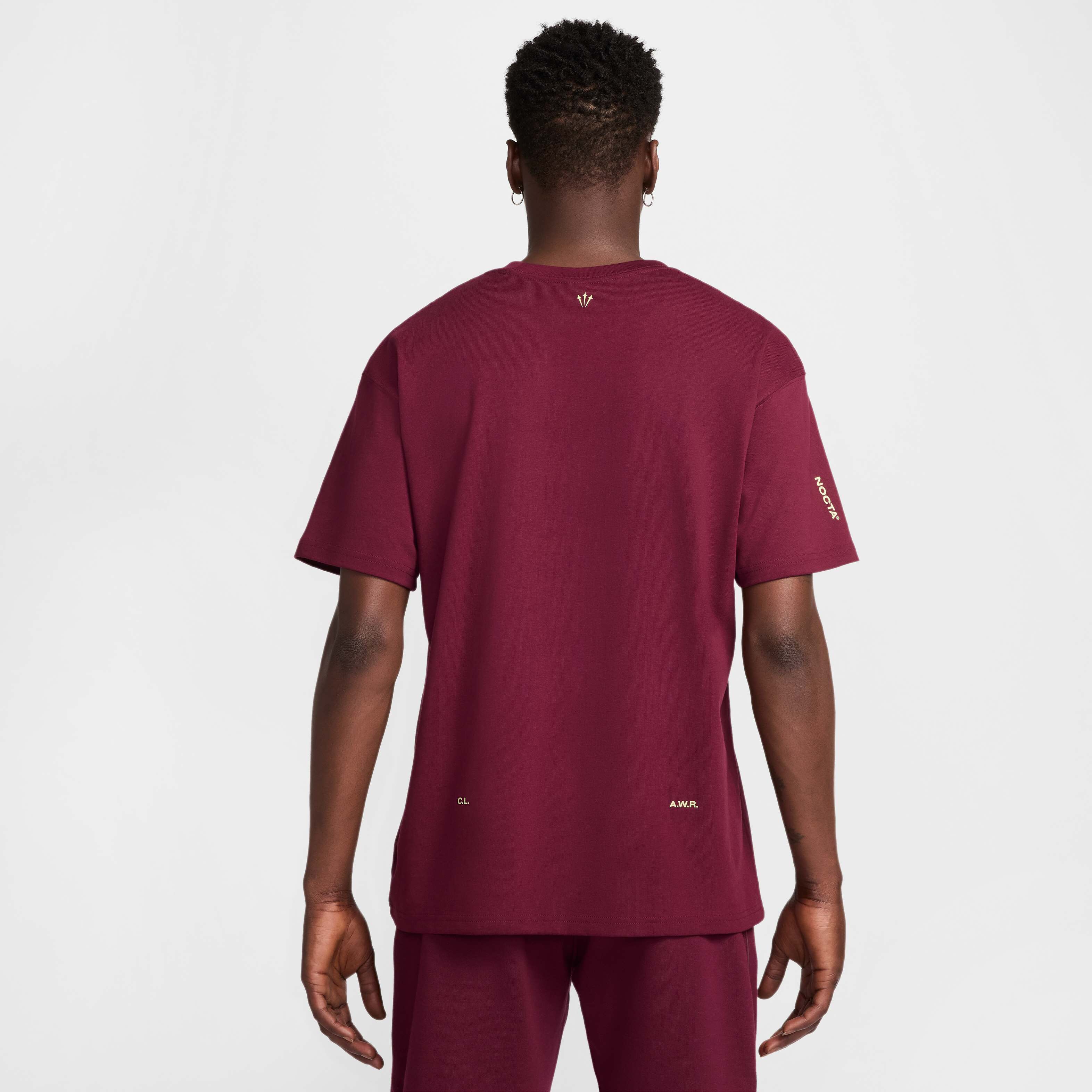 Buy NOCTA T-Shirt - Dark Beetroot/Citron Tint | Nike Saudi