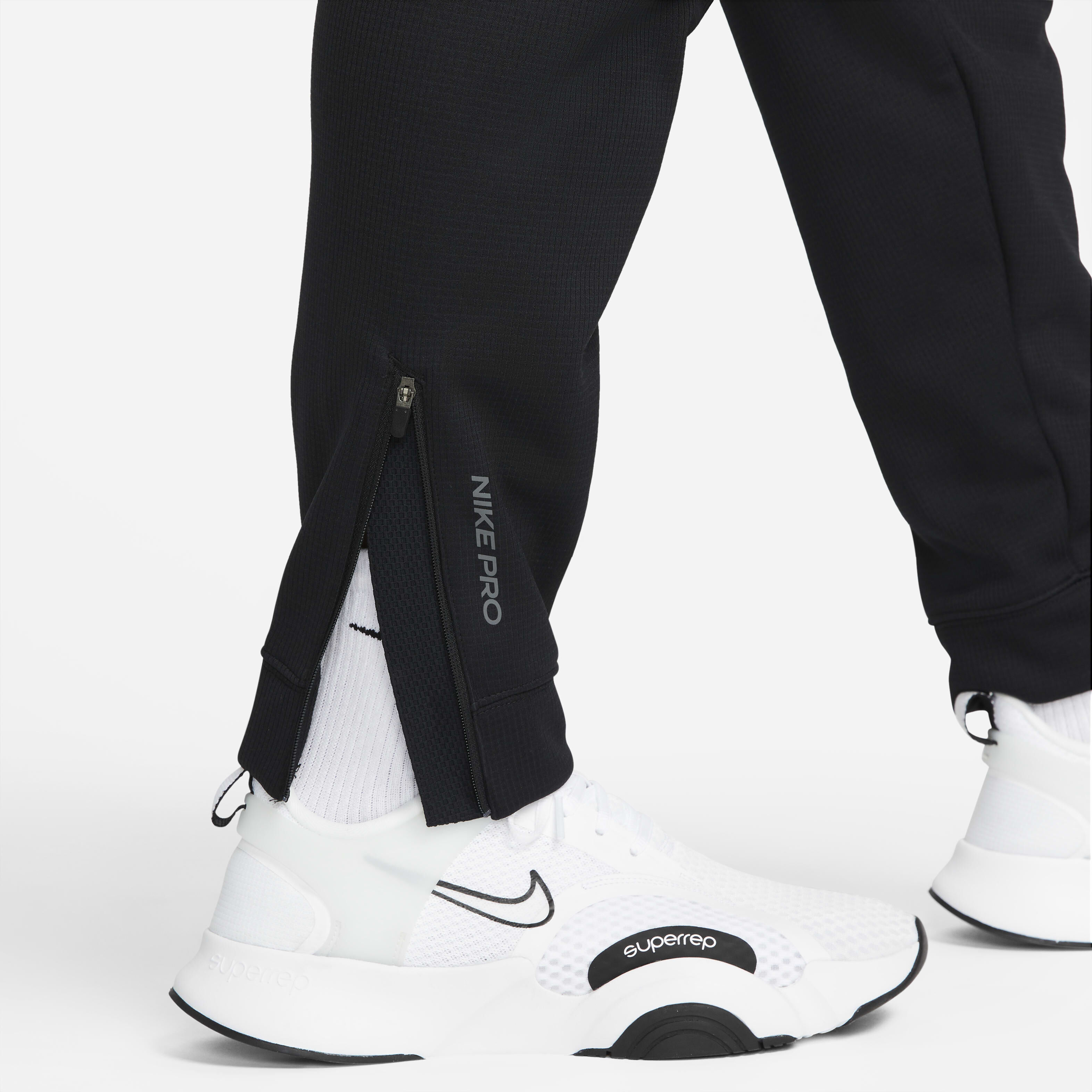 Buy Nike Therma Sphere Men s Therma FIT Fitness Trousers Nike Saudi Official
