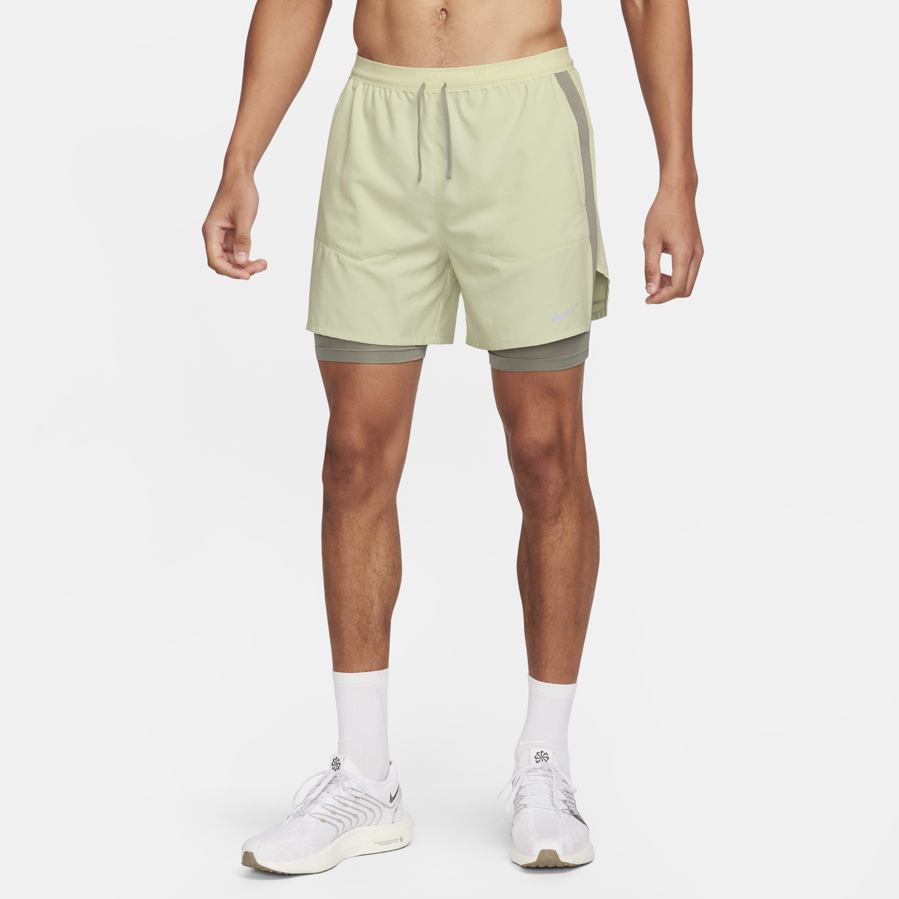Buy Nike Stride Men s Dri FIT 13cm approx. Hybrid Running Shorts Nike Saudi Official