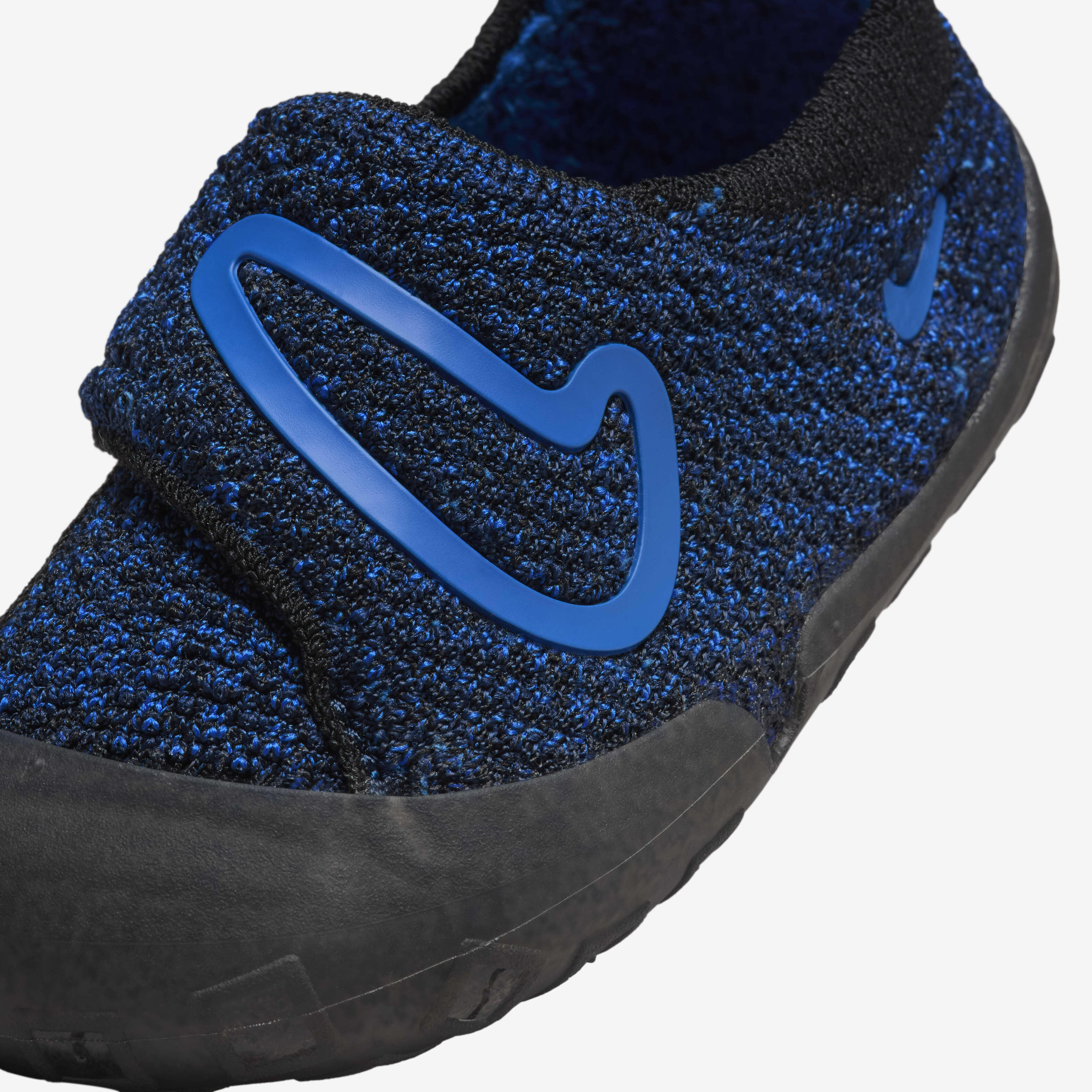 black nike with blue swoosh