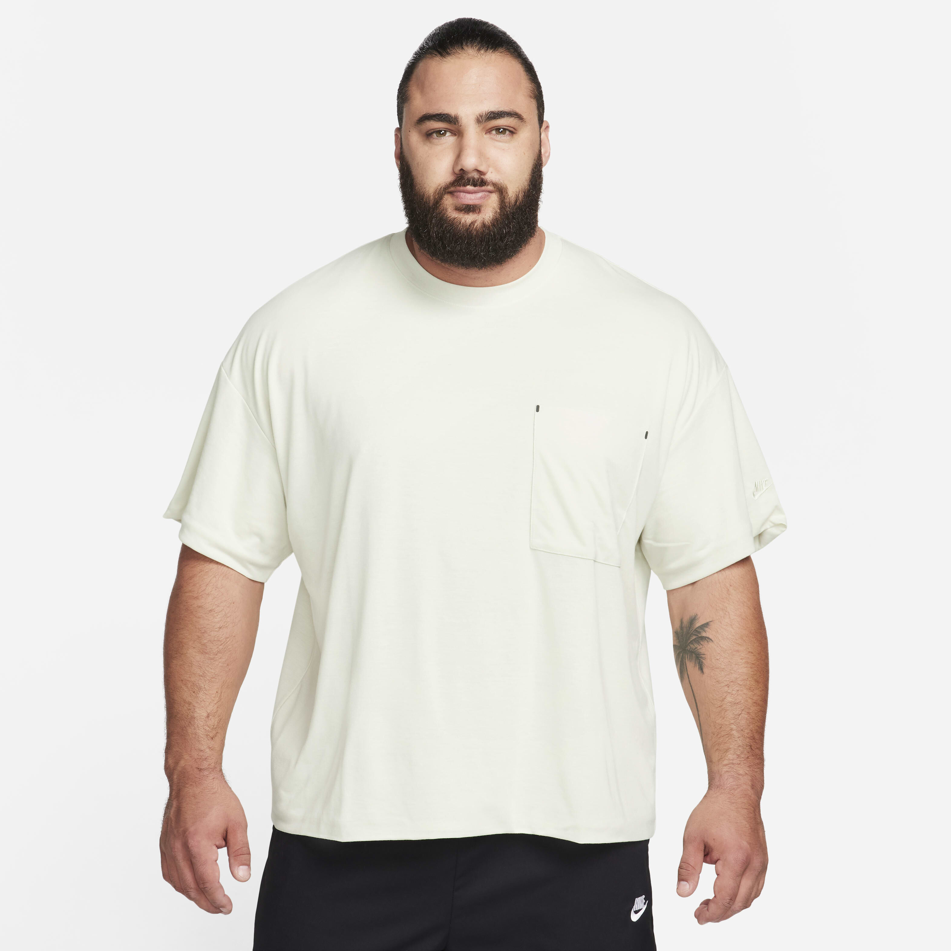 Buy Nike Sportswear Tech Pack Men s Dri FIT Short Sleeve Top Sea Glass Black Sea Glass Nike Saudi Official