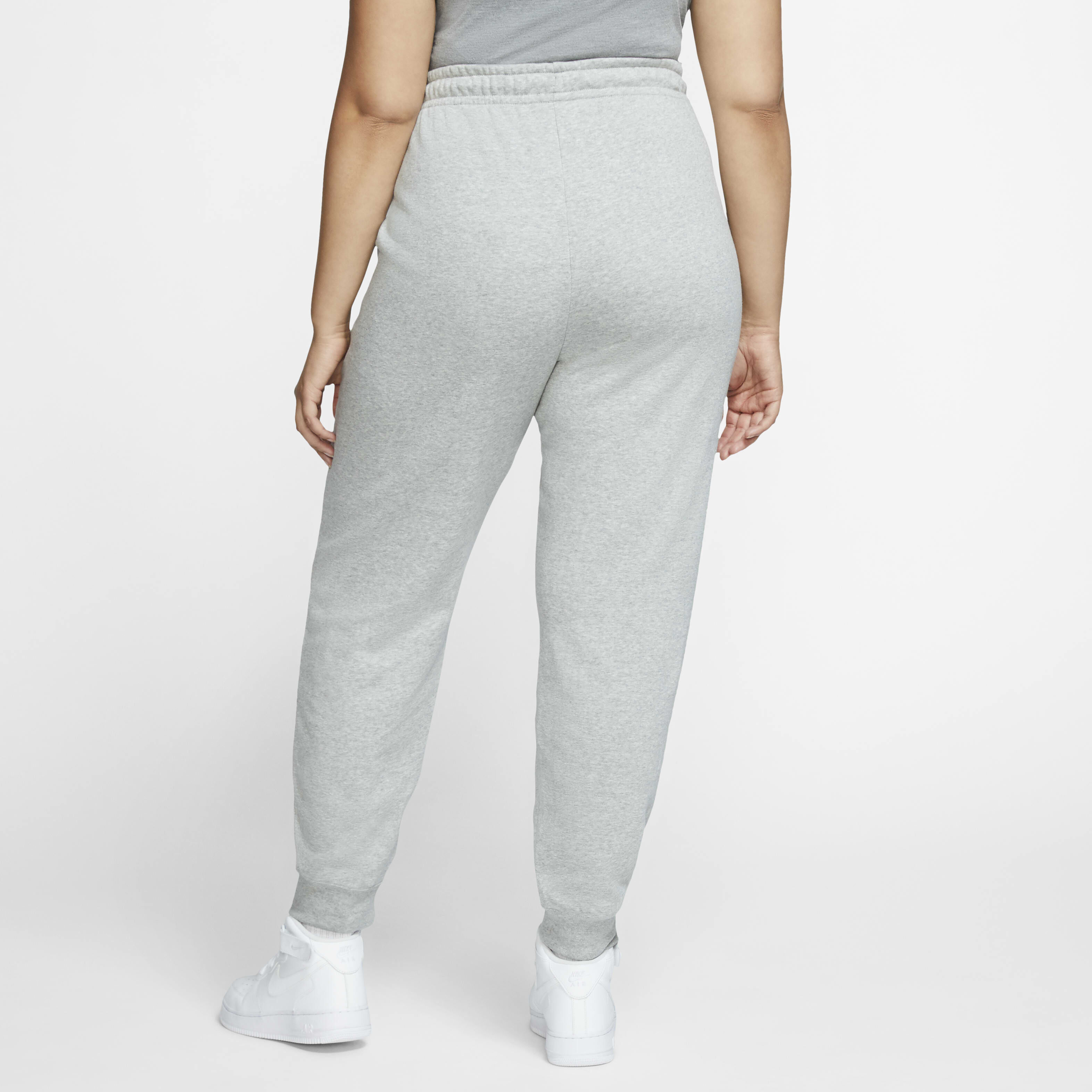 Buy Nike Sportswear Essential Women s Fleece Trousers Plus Size Dark Grey Heather White Nike Saudi Official